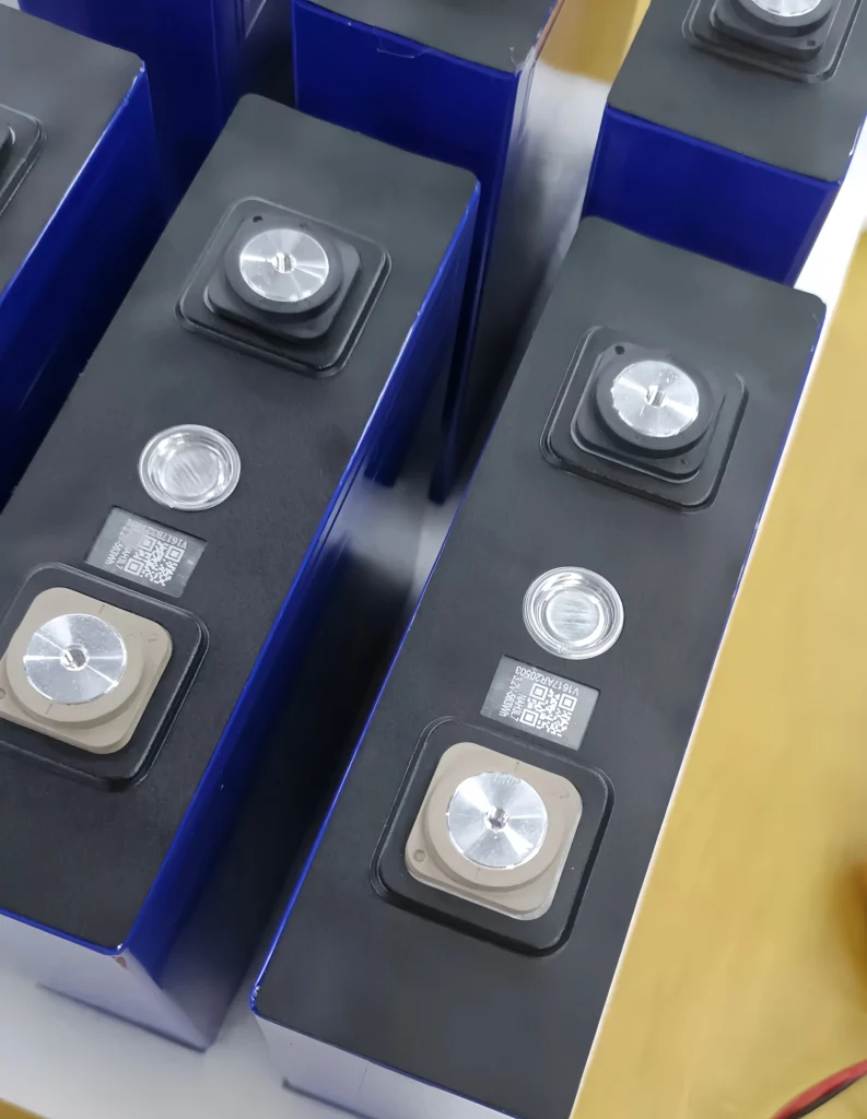 Authentic product photo of fresh CALB L173F130 Grade A 130Ah LiFePO4 cells in original blue shell, featuring precision terminals and traceable QR codes.